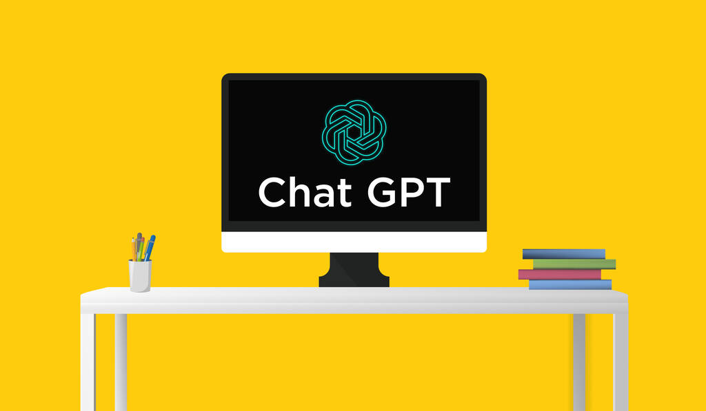 Chat GPT on screen, Artificial intelligence, Chat GPT on black screen with books on table computer table.